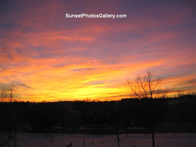 Colorful orange - red - blue sunrise clouds and sky - Nebraska Midwest country road - Sunset Photos Gallery