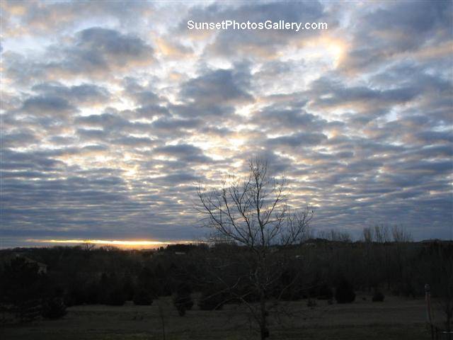 Colorful Sunset puffy blue clouds in sky - quiet rural Nebraska Midwest area