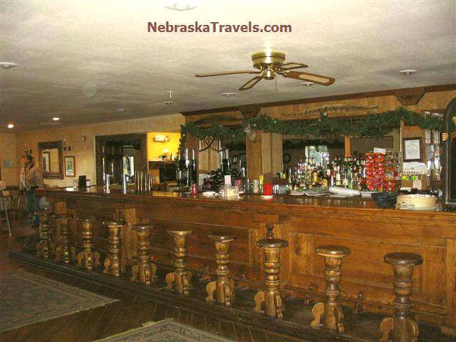 Uncle Bucks Lodge Wooden Barstools in Western Nebraska Sandhills near Brewster